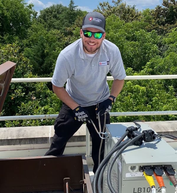 National Power team member working on a generator