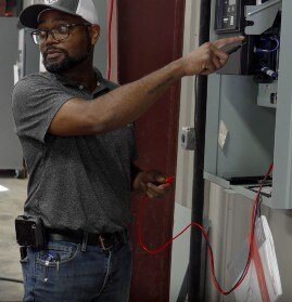 Engineer examining charger